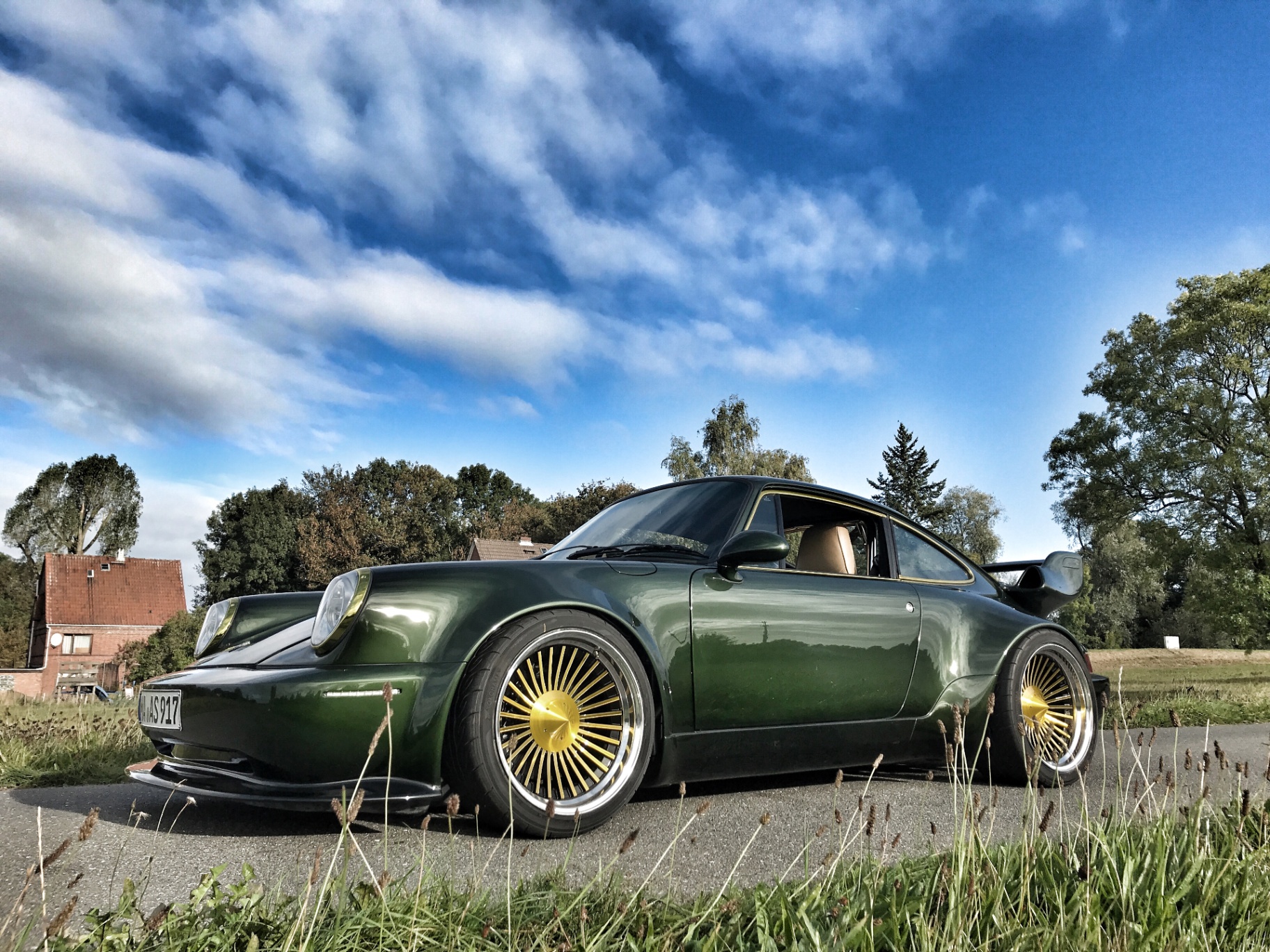 Custom widebody Porsche 911 in British racing green